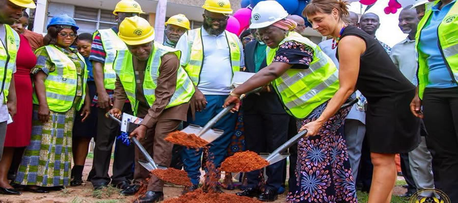 Trade Minister Cuts Sod. . .